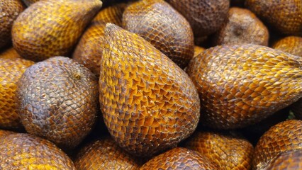 Bunch of snakefruit (Salacca zalacca) at the traditional market. Snakefruit is one of the tropical...