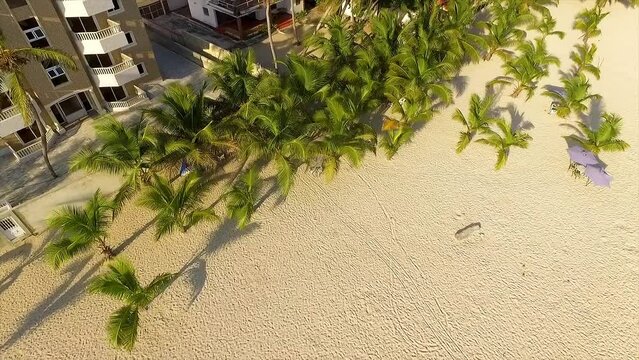 Pedestal drone shot revealing the apartments and condominiums by the beachfront of Miami, located in Itea in Central Greece.