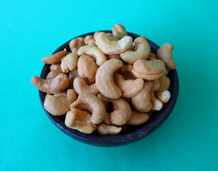 cashews are displayed in traditional and glass containers