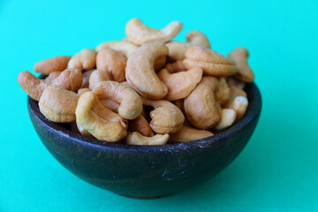 cashews are displayed in traditional and glass containers