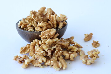 walnuts are displayed in traditional and glass containers