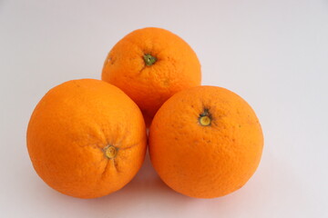 Fresh ripe oranges as background, top view