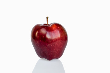 Red Delicious apple isolated on white background with reflection