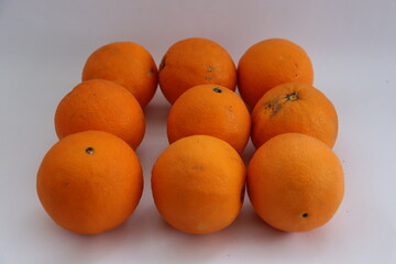 Fresh ripe oranges as background, top view