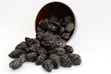 Dried Black Plum Jumbo, close-up with white background