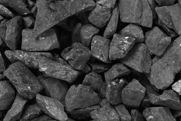 Coal. black crushed stone background texture close-up. rubble in a heap.