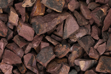 crushed stone crumb background texture close-up. rubble in a heap. natural decorative primer for designers. fraction