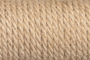 Jute ropes closeup, background texture. thick hemp rope. linen rope-wound. Hank ship rope