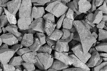 White crushed stone crumb background texture close-up. rubble in a heap. natural decorative primer...
