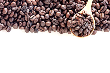 Close up coffee beans in wood spoon on white background.