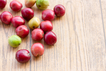 Close up fresh coffee beans on wood table