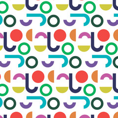 Seamless pattern with multi-colored hooks and circles on a white background. 