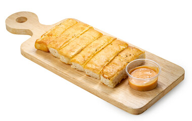 Cheese bread sticks with dipping cheese, Butter bread sticks isolated on woonden plate on white...