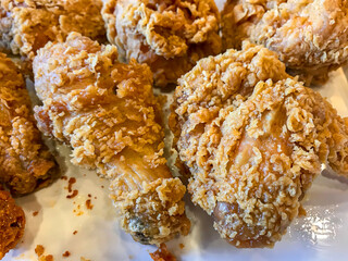 Close up fried chicken on the plate.
