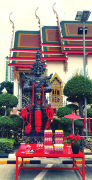 Bangkok, Thailand - March 3, 2024: Statue of Thao Wessuwan for worship and faith in sacredness with ancient church in Thai temples. Religion, Landmark for travel and Exterior design in Asia style.
