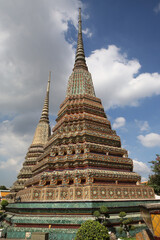 Fototapeta na wymiar Wat Phra Chetuphon Vimolmangklararm Rajwaramahaviharn (Wat Pho) Buddhist temple complex in Bangkok city, Thailand. Religious traditional national Thai architecture. Landmark, architectural monument