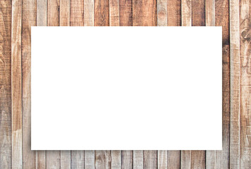 White paper and space for text on old wooden background.