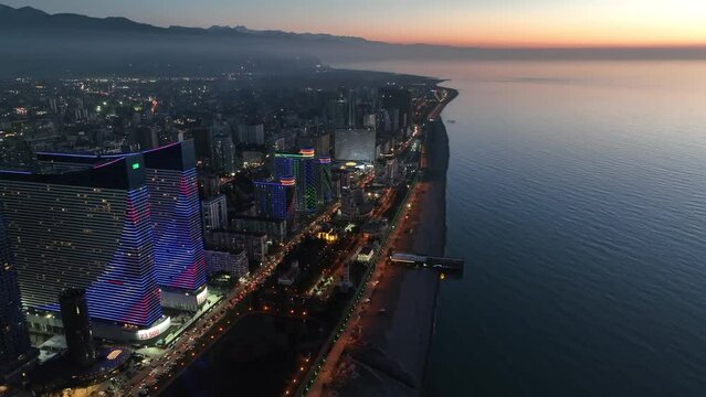 Flying over modern luxury hotel Colosseum Marina on Sherif Khimshiashvili street. Batumi, Georgia
