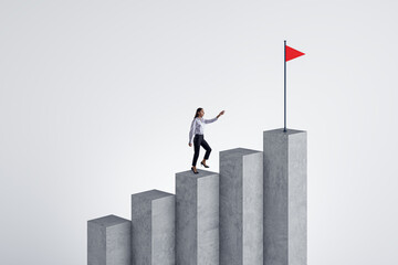 Woman climbing concrete business chart top with flag on white background. Success, financial growth and strategy concept. - obrazy, fototapety, plakaty