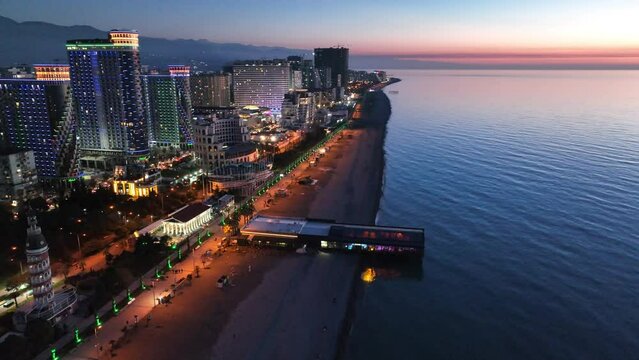 Flying over modern luxury hotel Colosseum Marina on Sherif Khimshiashvili street. Batumi, Georgia