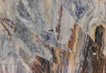 slab of colored marble white brown gray closeup texture