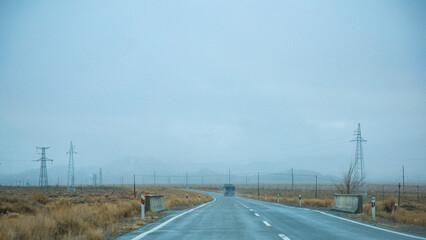 Hainan Mongolian and Tibetan Autonomous Prefecture, Qinghai Province-Grasslands and roads under the...