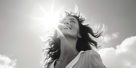 Fototapeta premium A woman smiling and gazing at the sky. Suitable for various concepts