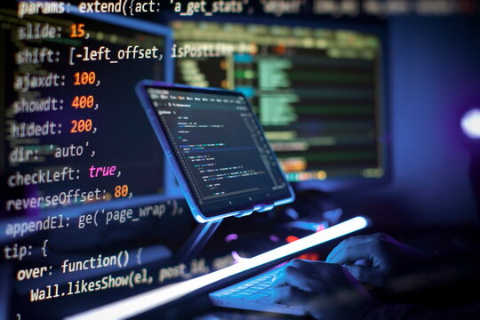 Working atmosphere of a programmer at home . ?oding html and programming on screen laptop, development web