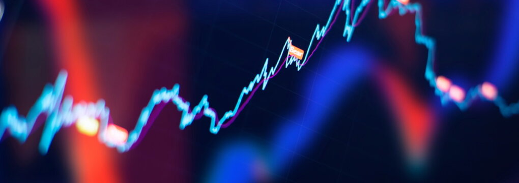 Candlesticks going up indicating crypto rising in value. Graphical representation of volumes and time intervals of digital cryptocurrency past price movements
