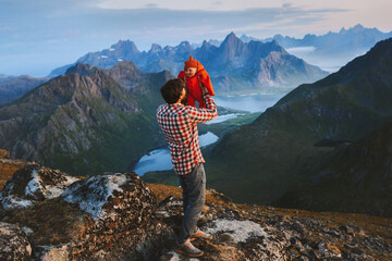 Family vacations in mountains father hiking with baby outdoor summer travel active healthy lifestyle tour dad with child sightseeing Lofoten islands in Norway, Fathers day holiday