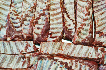 closeup view of raw marinated ribs ready for cooking - 763060105