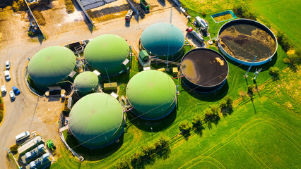 Biogas plant and farm in fields. Renewable energy from biomass. Agriculture prepared for Green Deal. Aerial view to Czech industry. Sustainable development in European Union.  - 763060341