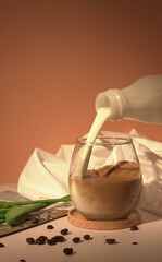 Prop, glasses and pouring milk and coffee.
