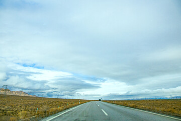 Hainan Mongolian and Tibetan Autonomous Prefecture, Qinghai Province-Grasslands and roads under the snow-capped mountains