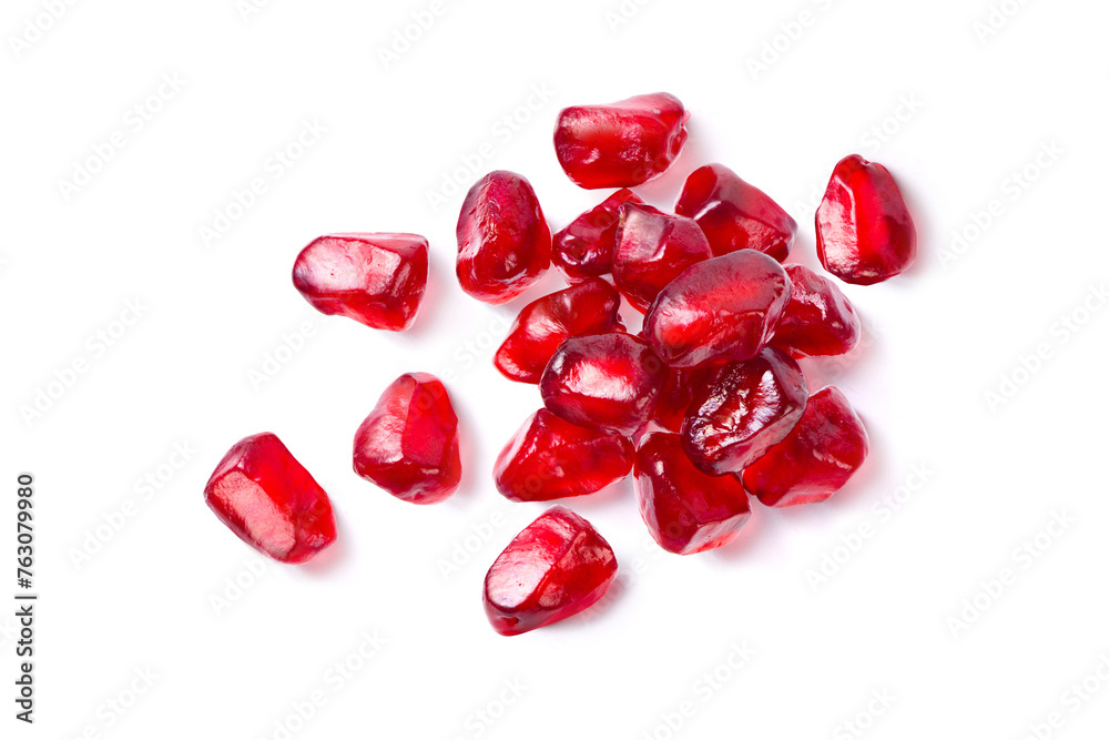 Wall mural top view of pomegranate seeds on a white background.