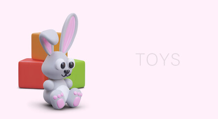 Children toys. Cute soft rabbit is sitting near colorful cubes. Safe entertainment for kids