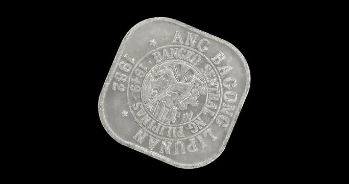Obverse of Philippines coin 1 sentimo 1982, isolated in black background. Seamless animation in 4k resolution video.