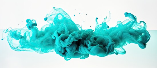 Electric blue liquid splashes in water creating an artistic pattern on a white background,...