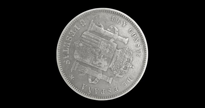Reverse of old Spain coin 5 pesetas 1891, isolated in black background. Loopable animation in 4k resolution video.