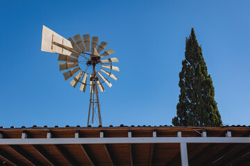 Wind powered water pump intavern in Sotira, Cyprus