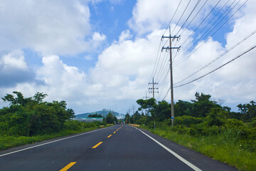 Side view on Jeju Island's main road in summer, South Korea.