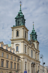 Fototapeta na wymiar Holy Cross Church on Krakowskie Przedmiescie Street in Warsaw, Poland