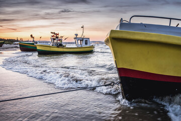 Fishing boats on Baltic Sea beach in Karlikowo District in Sopot city, Poland