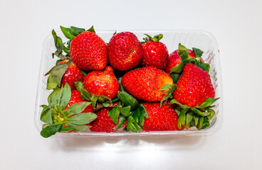 ripe red strawberries on a white background - 763094750