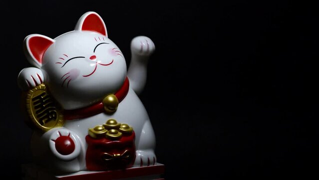 The Lucky Cat , shacking hands
