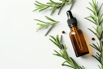 Rosemary oil bottle on wooden background. Essential oil, aromatherapy natural remedies - obrazy, fototapety, plakaty