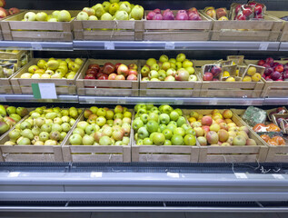 buying fruits (apples ) at the market
