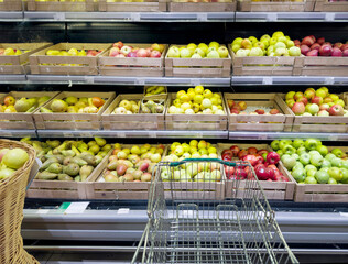 buying fruits (apples ) at the market