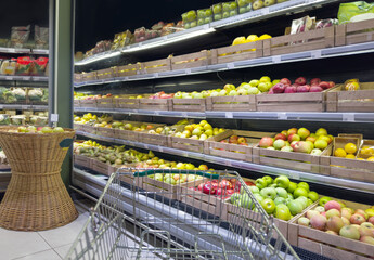 buying fruits (apples ) at the market