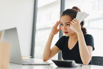 Stressed Young Woman with Calculator and Receipt.